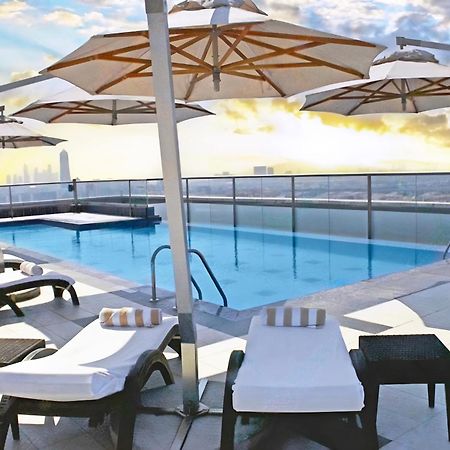 Park Regis Kris Kin Hotel Dubai Exterior foto Rooftop pool
