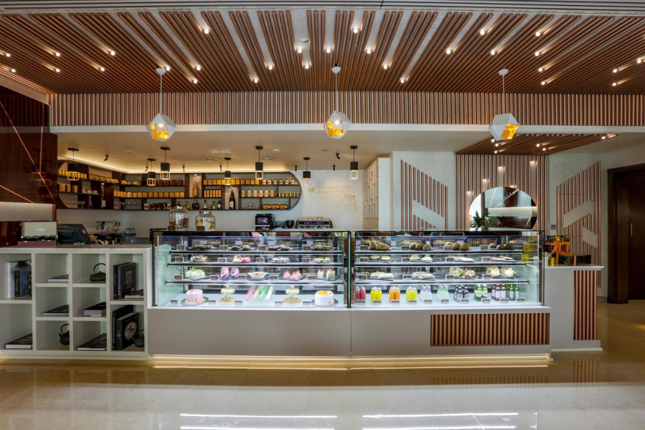Park Regis Kris Kin Hotel Dubai Exterior foto A pastry shop in Bangkok, Thailand