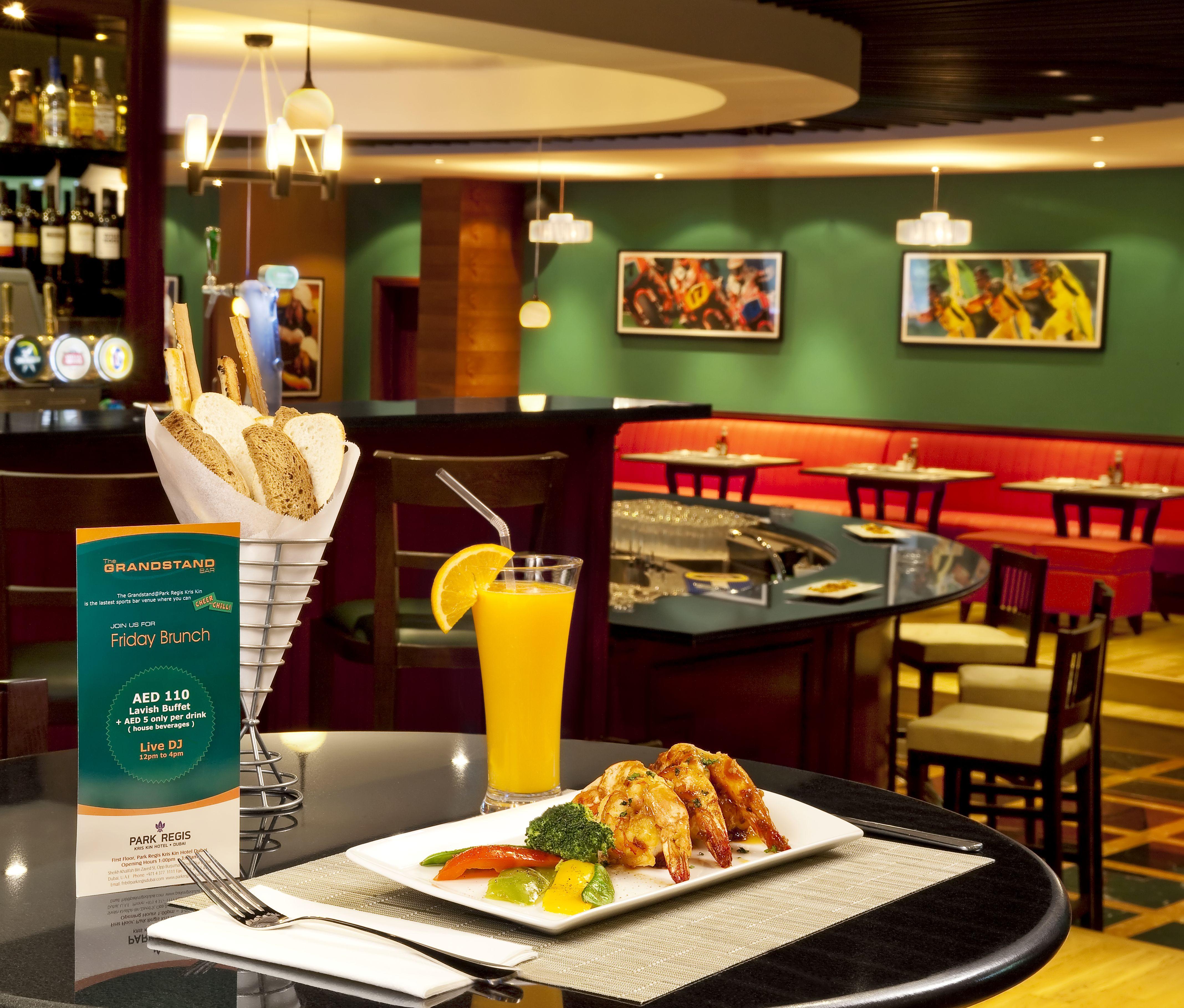 Park Regis Kris Kin Hotel Dubai Exterior foto A restaurant in Dubai