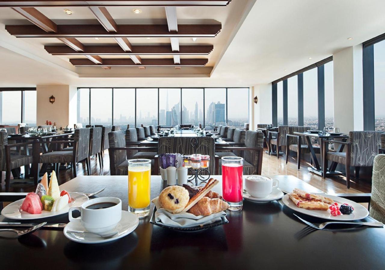 Park Regis Kris Kin Hotel Dubai Exterior foto The Club at Haneda Airport