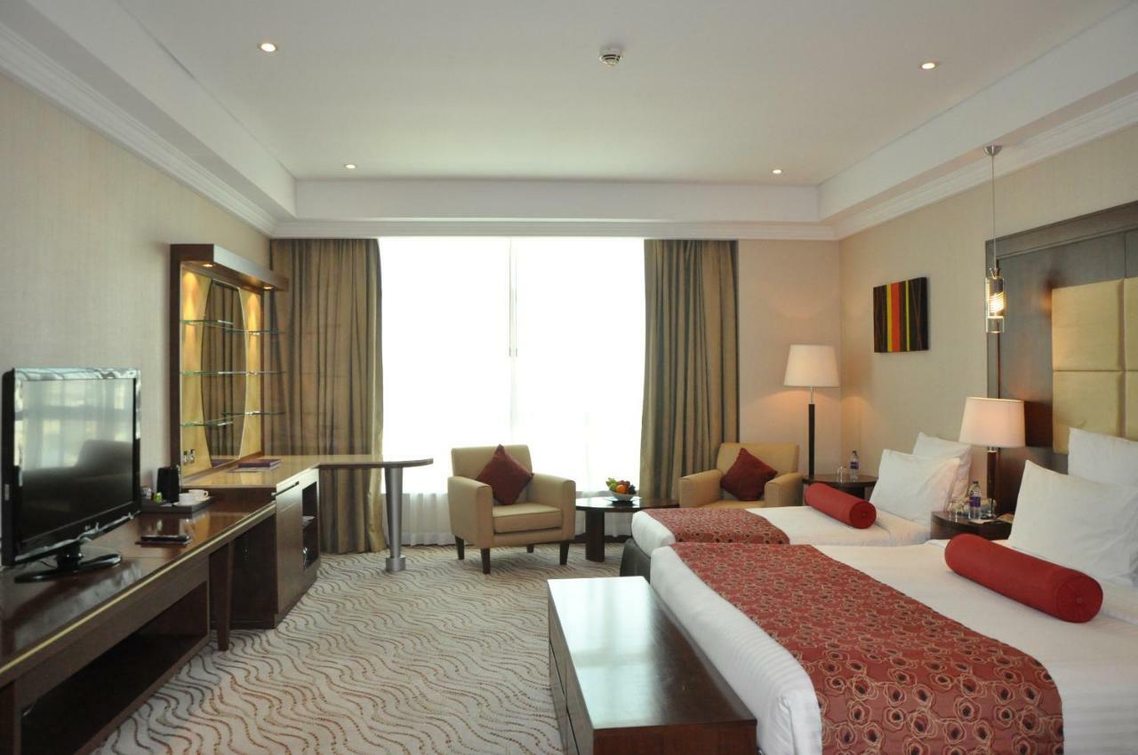Park Regis Kris Kin Hotel Dubai Exterior foto A room at the hotel