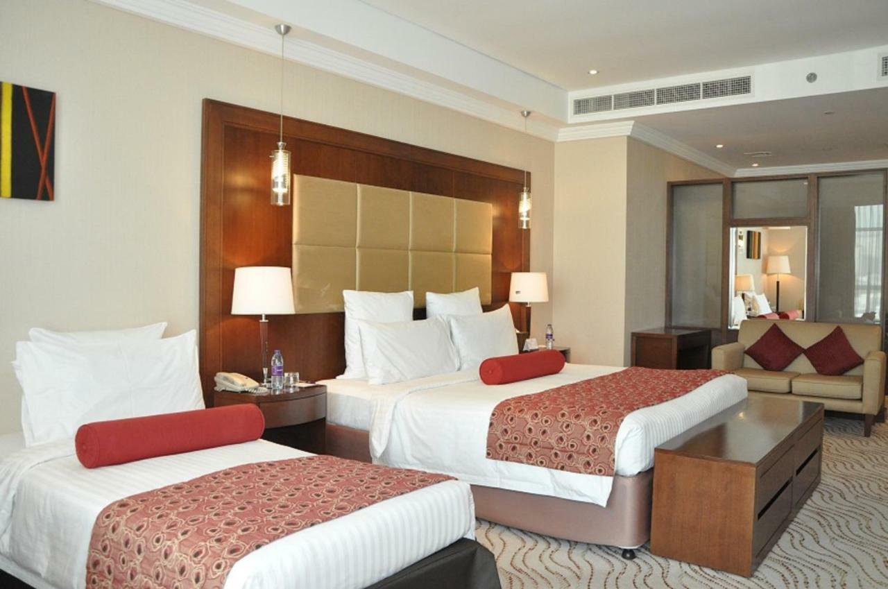Park Regis Kris Kin Hotel Dubai Exterior foto A room at the hotel